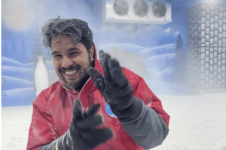 Visitor enjoying the cold snow room